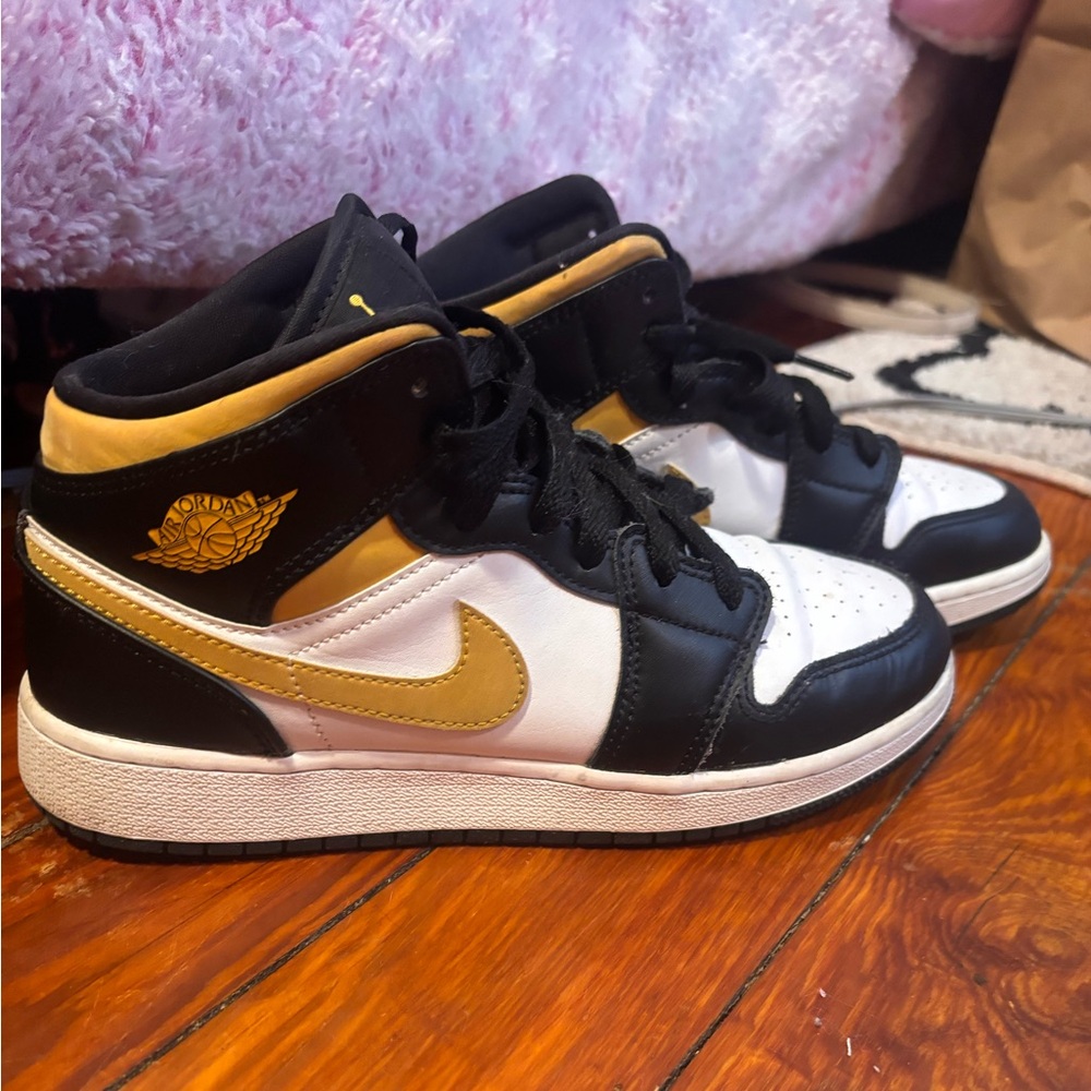 Nike Air Jordan 1's Black and Gold High-Top Sneakers